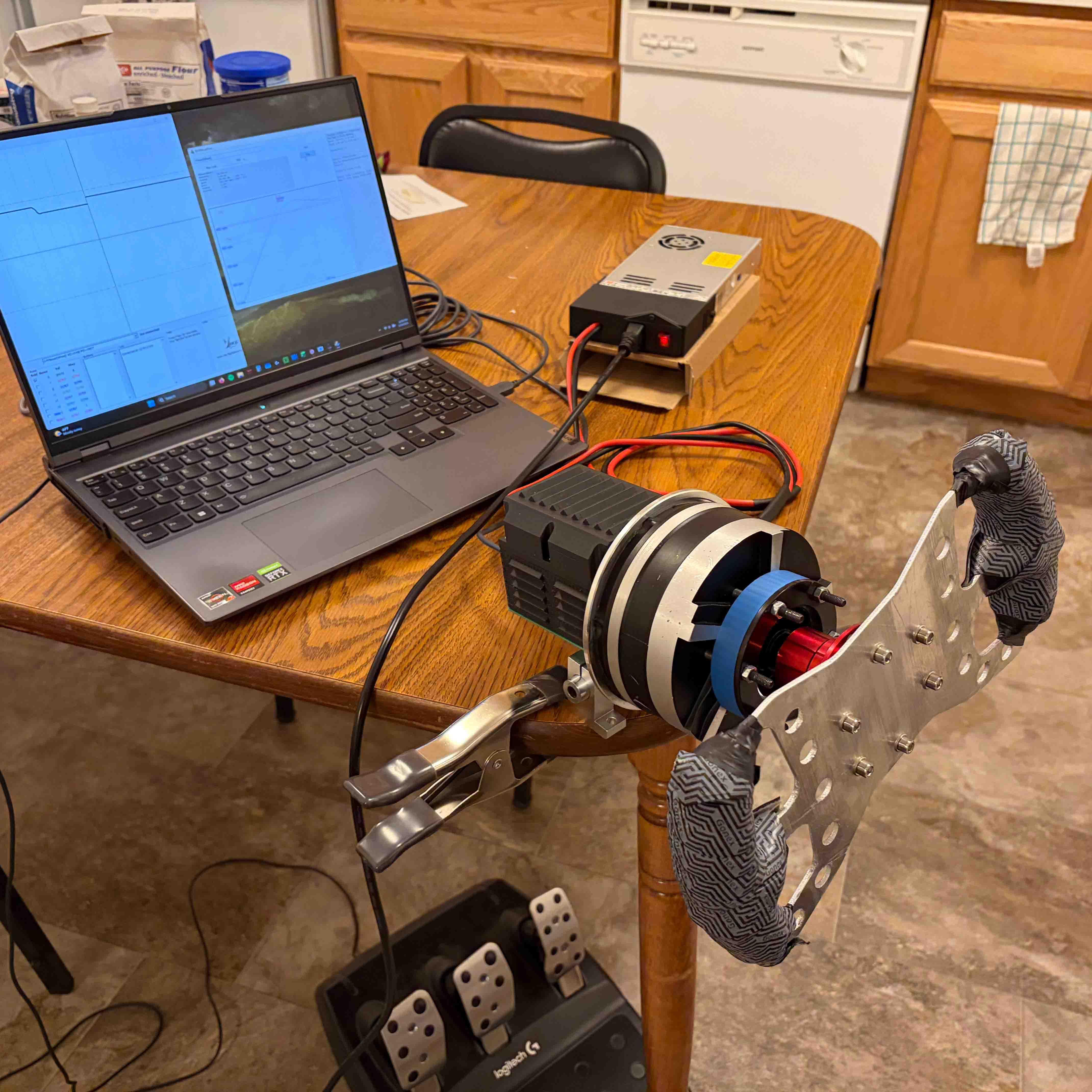Carson Moncur: This direct drive sim racing wheelbase is built around a 30mm magnet hoverboard motor, a Meanwell LRS-350-24 PSU, a MKS XDrive-S controller, and the FFBeast firmware.