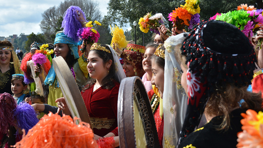 Two Women play the Daf at the Nowruz Spring Walk on UCLA campus