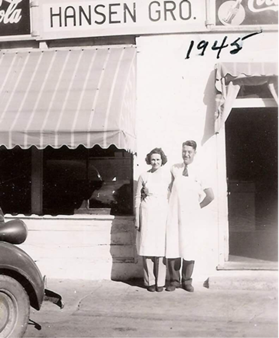 A 1945 photo of Hansen Grocery and owners